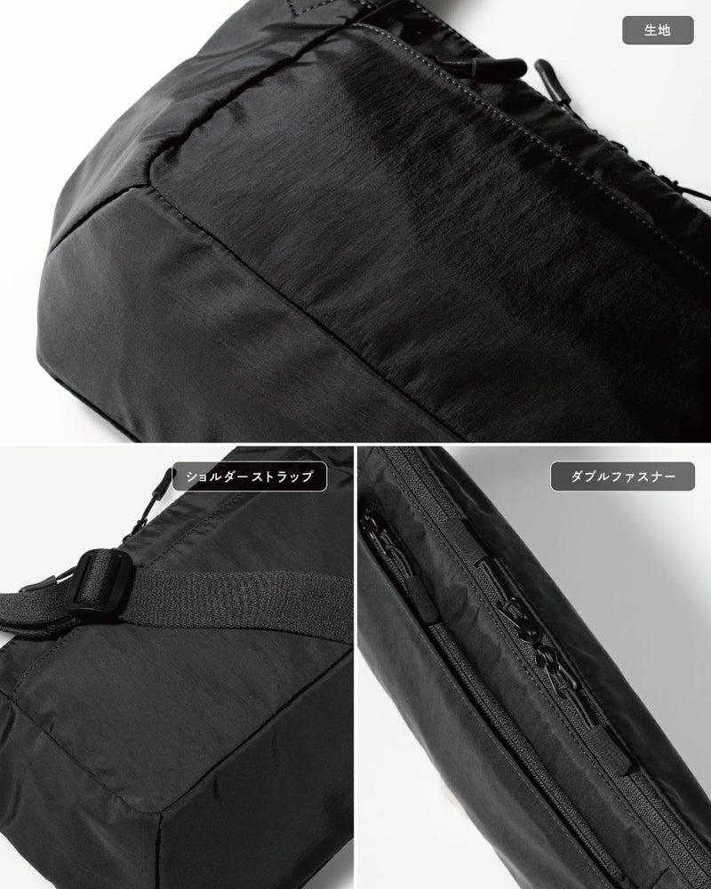 メンズショルダーバッグのディテールを示すクローズアップ。生地感、ショルダーストラップ、ダブルファスナー。
